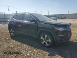 2017 Jeep Compass Latitude with VIN 3C4NJDBB3HT651453, listed as a Copart auction lot 48102715 with 69,410 mi miles and Salvage Title. Bid and sale history available at carsss.com. Image 4.