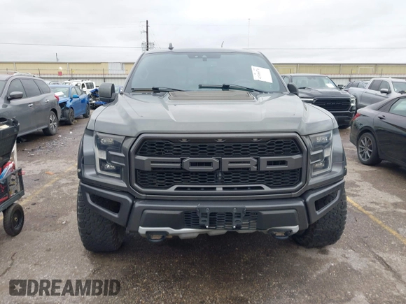 2020 Ford F-150 Raptor with VIN 1FTFW1RG0LFB66566, listed as a IAAI auction lot 41306076 with 92,596 mi miles and . Bid and sale history available at carsss.com. Image 12.