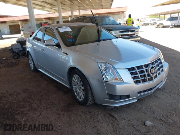 2013 Cadillac CTS Luxury with VIN 1G6DE5E52D0156666, listed as a IAAI auction lot 42058687 with 120,659 mi miles and . Bid and sale history available at DreamBid. Image 1.