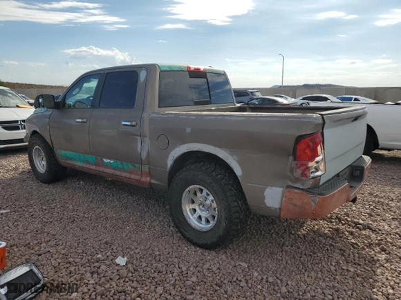2010 Dodge Ram 1500 SLT with VIN 1D7RB1CP2AS141633, listed as a Copart auction lot 69499904 with 129,488 mi miles and Salvage Title. Bid and sale history available at carsss.com. Image 2.
