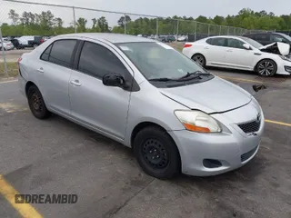 2009 Toyota Yaris with VIN JTDBT903394043218, listed as a IAAI auction lot 41974570 with 281,000 mi miles. Bid and sale history available at carsss.com. Image 1.