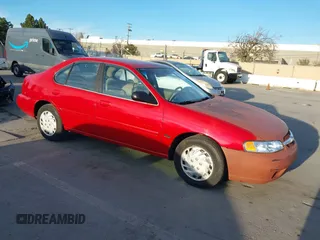 2001 Nissan Altima GXE with VIN 1N4DL01DX1C166896, listed as a IAAI auction lot 41335212 with 163,236 mi miles. Bid and sale history available at carsss.com. Image 1.