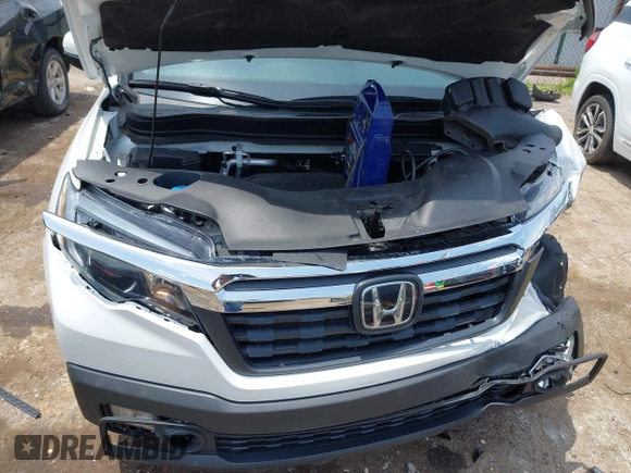2020 Honda Ridgeline RTL with VIN 5FPYK3F51LB029859, listed as a IAAI auction lot 42462285 with 57,399 mi miles and . Bid and sale history available at DreamBid. Image 10.