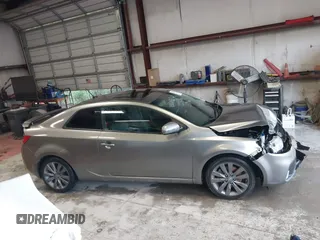 2012 Kia Forte SX z VIN KNAFW6A32C5489669, wystawiony jako IAAI lot #42237474 z przebiegiem 172 520 mil mil oraz . Historia ofert i sprzedaży dostępna na DreamBid. Obrazek 13.