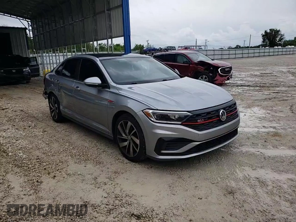 2019 Volkswagen Jetta GLI S z VIN 3VW6T7BU4KM222404, wystawiony jako Copart lot #55097435 z przebiegiem 121 664 mil mil oraz Szkoda całkowita • Salvage title. Historia ofert i sprzedaży dostępna na DreamBid. Obrazek 14.