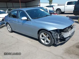 2014 BMW 3 Series 328i with VIN WBA3C1C51EK115278, listed as a IAAI auction lot 41979591 with 129,112 mi miles. Bid and sale history available at carsss.com. Image 1.
