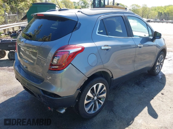 2019 Buick Encore Essence with VIN KL4CJGSM5KB869925, listed as a IAAI auction lot 41937487 with 105,702 mi miles. Bid and sale history available at carsss.com. Image 4.