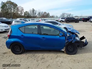 2016 Toyota Prius c One with VIN JTDKDTB34G1590133, listed as a IAAI auction lot 40962988 with 132,868 mi miles. Bid and sale history available at carsss.com. Image 14.