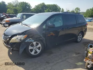 2012 Toyota Sienna LE AAS with VIN 5TDKK3DC0CS208115, listed as a Copart auction lot 61562165 with 75,664 mi miles and Salvage title. Bid and sale history available at DreamBid. Image 1.