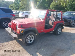 2000 Jeep Wrangler SE with VIN 1J4FA29P6YP775127, listed as a IAAI auction lot 42377387 with Not provided miles and . Bid and sale history available at DreamBid. Image 2.