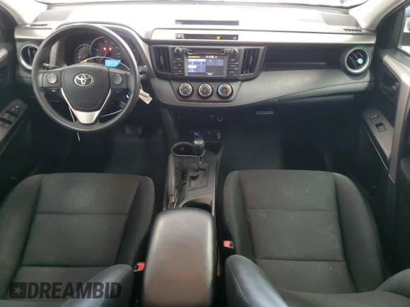 2016 Toyota RAV4 LE with VIN 2T3BFREV3GW490181, listed as a Copart auction lot 52457435 with 128,267 mi miles and Salvage Title. Bid and sale history available at DreamBid. Image 8.