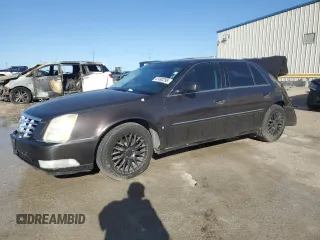 2009 Cadillac DTS 1SA z VIN 1G6KD57Y39U136301, wystawiony jako Copart lot #47492295 z przebiegiem 127 818 mil mil oraz Szkoda całkowita • Salvage title. Historia ofert i sprzedaży dostępna na DreamBid. Obrazek 1.