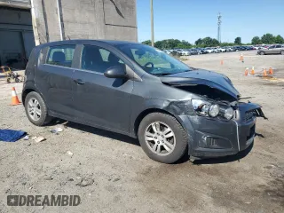 2014 Chevrolet Sonic LT with VIN 1G1JC6SH9E4170822, listed as a Copart auction lot 58460254 with 158,792 mi miles and Salvage Title. Bid and sale history available at carsss.com. Image 4.