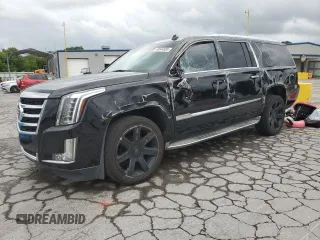 2015 Cadillac Escalade ESV Luxury with VIN 1GYS3HKJ1FR183167, listed as a Copart auction lot 58544585 with 104,636 mi miles and Salvage title. Bid and sale history available at DreamBid. Image 1.