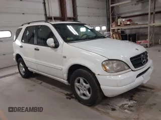 2000 Mercedes-Benz M-Class with VIN 4JGAB54E2YA166846, listed as a IAAI auction lot 41744657 with 226,711 mi miles. Bid and sale history available at carsss.com. Image 1.