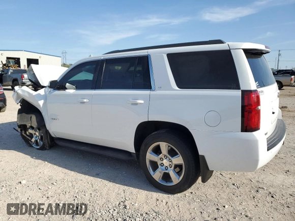 2020 Chevrolet Tahoe LT z VIN 1GNSKBKC7LR124845, wystawiony jako Copart lot #53354715 z przebiegiem Nie podano mil oraz Szkoda całkowita • Salvage title. Historia ofert i sprzedaży dostępna na DreamBid. Obrazek 2.