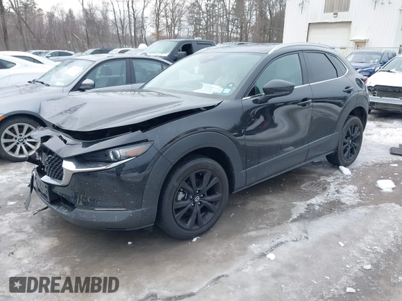 2021 Mazda CX-30 Premium with VIN 3MVDMBDY1MM269353, listed as a IAAI auction lot 41644391 with 29,409 mi miles and . Bid and sale history available at carsss.com. Image 2.