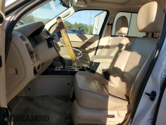 2011 Ford Escape Limited with VIN 1FMCU9EG0BKB89084, listed as a Copart auction lot 87066594 with 112,625 mi miles and Salvage Title. Bid and sale history available at DreamBid. Image 7.