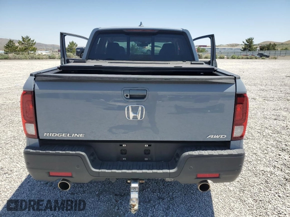 2022 Honda Ridgeline RTL-E with VIN 5FPYK3F79NB024459, listed as a Copart auction lot 59165445 with 21,429 mi miles and Salvage title. Bid and sale history available at DreamBid. Image 6.