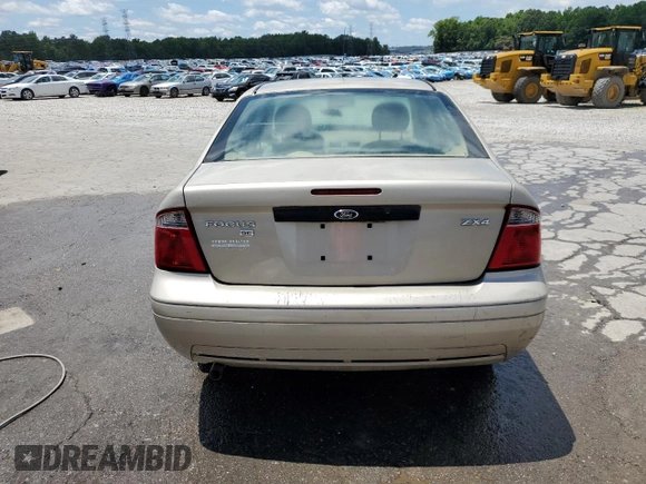 2006 Ford Focus S z VIN 1FAFP34N46W154378, wystawiony jako Copart lot #58422605 z przebiegiem Nie podano mil oraz Szkoda całkowita • Salvage title. Historia ofert i sprzedaży dostępna na DreamBid. Obrazek 6.