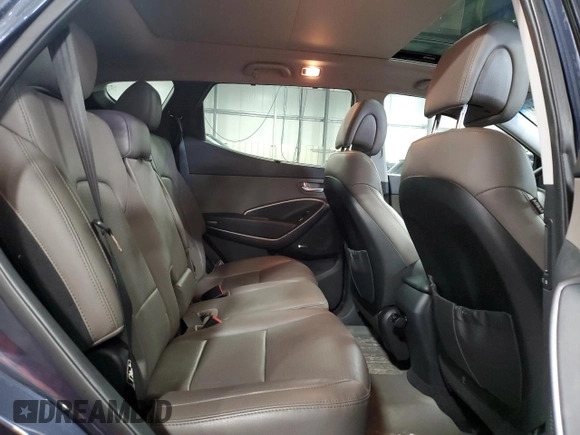 2014 Hyundai Santa Fe z VIN 5XYZUDLB0EG200376, wystawiony jako Copart lot #53634165 z przebiegiem 64 561 mil mil oraz Szkoda całkowita • Salvage title. Historia ofert i sprzedaży dostępna na DreamBid. Obrazek 11.
