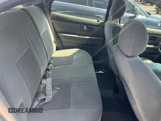 2003 Ford Taurus SE Standard z VIN 1FAFP58283A155067, wystawiony jako Copart lot #54555045 z przebiegiem 159 296 mil mil oraz Tytuł czysty. Historia ofert i sprzedaży dostępna na DreamBid. Obrazek 6.