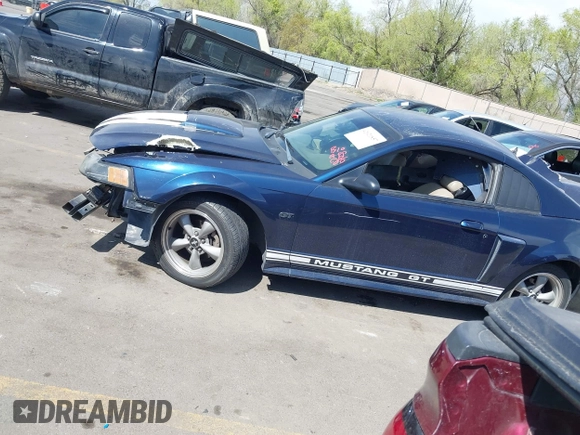 2002 Ford Mustang GT Deluxe z VIN 1FAFP42X12F191957, wystawiony jako IAAI lot #42021857 z przebiegiem Nie podano mil oraz . Historia ofert i sprzedaży dostępna na DreamBid. Obrazek 14.
