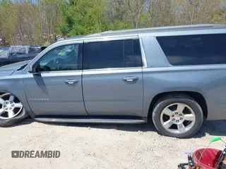 2016 Chevrolet Suburban LT z VIN 1GNSKHKC4GR427591, wystawiony jako IAAI lot #42162723 z przebiegiem 131 771 mil mil oraz . Historia ofert i sprzedaży dostępna na DreamBid. Obrazek 14.