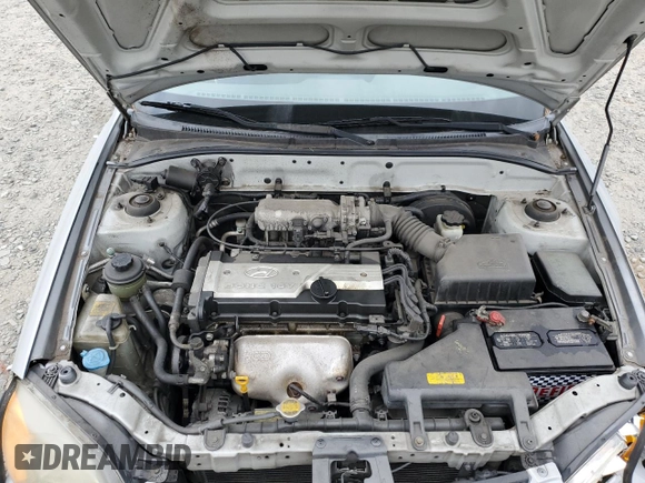 2005 Hyundai Accent GLS z VIN KMHCG45C75U639281, wystawiony jako Copart lot #54887095 z przebiegiem 136 090 mil mil oraz Szkoda całkowita • Salvage title. Historia ofert i sprzedaży dostępna na DreamBid. Obrazek 11.