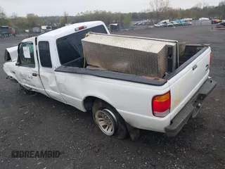 1999 Ford Ranger XL with VIN 1FTYR14V0XTA11657, listed as a IAAI auction lot 42011219 with 315,116 mi miles. Bid and sale history available at carsss.com. Image 3.