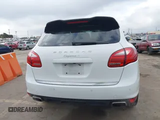 2014 Porsche Cayenne S Hybrid with VIN WP1AE2A28ELA51123, listed as a IAAI auction lot 42091475 with 41,341 mi miles and . Bid and sale history available at DreamBid. Image 16.