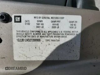 2002 Pontiac Sunfire SE z VIN 1G2JB124327288986, wystawiony jako Copart lot #64072634 z przebiegiem 122 306 mil mil oraz Szkody całkowita. Historia ofert i sprzedaży dostępna na DreamBid. Obrazek 12.