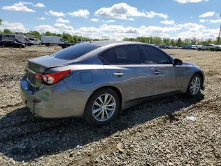 2014 Infiniti Q50 Premium with VIN JN1BV7AR4EM687969, listed as a Copart auction lot 55924805 with 174,625 mi miles and Salvage Title. Bid and sale history available at DreamBid. Image 3.