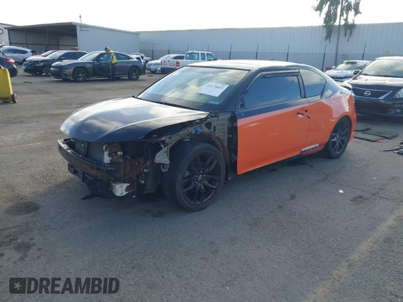 2015 Scion tC with VIN JTKJF5C79FJ008795, listed as a IAAI auction lot 41570815 with 88,809 mi miles. Bid and sale history available at carsss.com. Image 18.