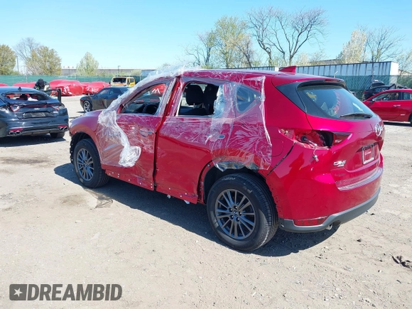 2019 Mazda CX-5 Sport with VIN JM3KFBBM6K1596402, listed as a IAAI auction lot 41971766 with 60,396 mi miles and . Bid and sale history available at DreamBid. Image 3.
