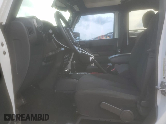 2017 Jeep Wrangler Unlimited Sport with VIN 1C4BJWDG6HL709901, listed as a Copart auction lot 55262645 with 100,887 mi miles and Salvage title. Bid and sale history available at DreamBid. Image 7.