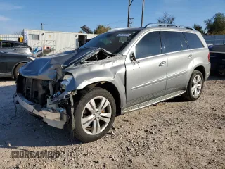 2010 Mercedes-Benz GL-Class GL 450 with VIN 4JGBF7BE6AA606161, listed as a Copart auction lot 82145924 with 173,729 mi miles and Salvage Title. Bid and sale history available at carsss.com. Image 1.
