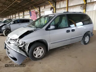 2000 Dodge Caravan with VIN 2B4GP25GXYR896821, listed as a Copart auction lot 58079985 with 217,327 mi miles and Salvage title. Bid and sale history available at DreamBid. Image 1.
