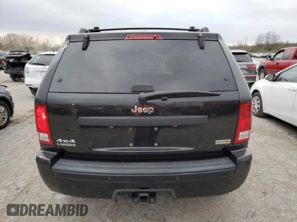 2009 Jeep Grand Cherokee Laredo with VIN 1J8HR48P19C514557, listed as a Copart auction lot 81830634 with 109,811 mi miles and Salvage Title. Bid and sale history available at carsss.com. Image 6.