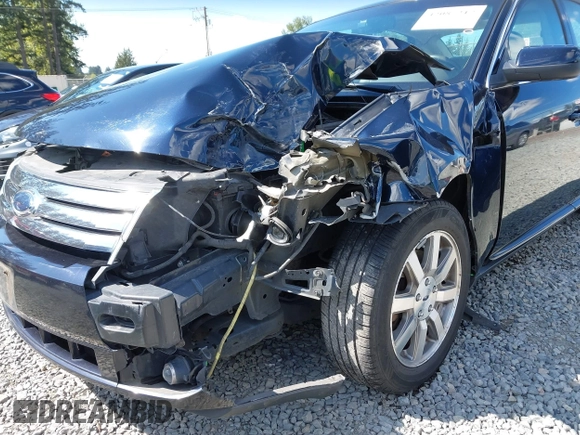 2008 Ford Taurus SEL with VIN 1FAHP24W98G140677, listed as a IAAI auction lot 42087217 with 151,693 mi miles. Bid and sale history available at carsss.com. Image 6.