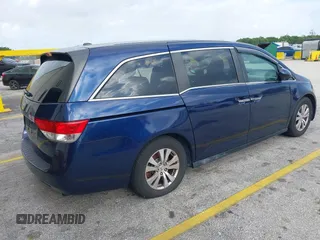 2016 Honda Odyssey EX-L with VIN 5FNRL5H60GB064815, listed as a IAAI auction lot 38644382 with 84,499 mi miles. Bid and sale history available at carsss.com. Image 4.