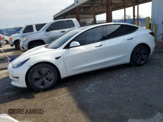 2021 Tesla Model 3 Standard Range Plus z VIN 5YJ3E1EA2MF084092, wystawiony jako Copart lot #56187355 z przebiegiem 26 735 mil mil oraz Nie do naprawy • Non repairable. Historia ofert i sprzedaży dostępna na DreamBid. Obrazek 1.
