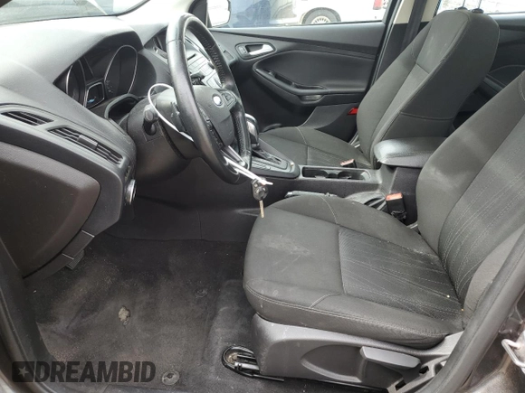 2015 Ford Focus SE with VIN 1FADP3F20FL267322, listed as a Copart auction lot 53678225 with 83,048 mi miles and Salvage Title. Bid and sale history available at DreamBid. Image 7.