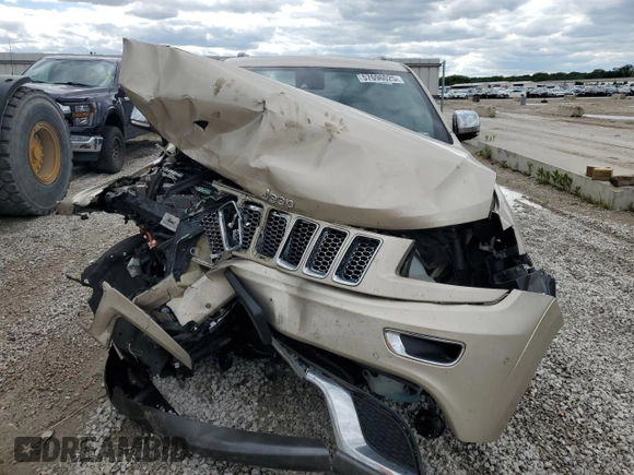 2014 Jeep Grand Cherokee Summit с VIN 1C4RJFJG8EC219264, выставлен на аукционе Copart как лот 57696025 с пробегом Не указан миль и Списание • Salvage title. История ставок и продаж доступна на DreamBid. Изображение 5.