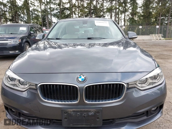 2018 BMW 3 Series 320i xDrive with VIN WBA8E5G53JNV03333, listed as a IAAI auction lot 42018275 with 45,950 mi miles. Bid and sale history available at carsss.com. Image 12.