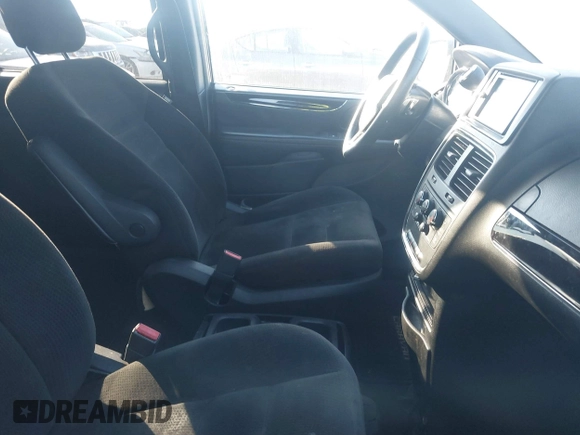 2016 Dodge Grand Caravan SE with VIN 2C4RDGBG1GR357895, listed as a IAAI auction lot 41389733 with 131,175 mi miles and . Bid and sale history available at DreamBid. Image 5.