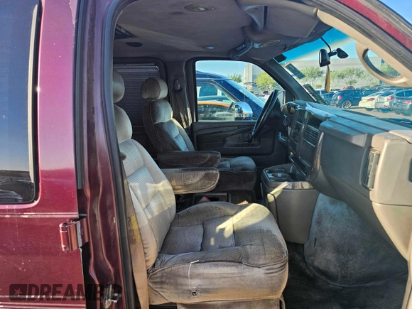 2004 Chevrolet Express Passenger z VIN 1GBFG15T141225336, wystawiony jako Copart lot #79581294 z przebiegiem Nie podano mil oraz Czysty tytuł • Clean title. Historia ofert i sprzedaży dostępna na DreamBid. Obrazek 5.
