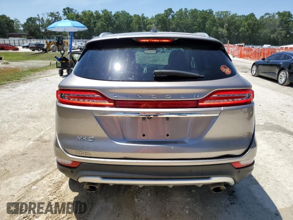 2019 Lincoln MKC Reserve with VIN 5LMCJ3C97KUL02010, listed as a Copart auction lot 57616845 with 73,501 mi miles and Non repairable. Bid and sale history available at DreamBid. Image 6.