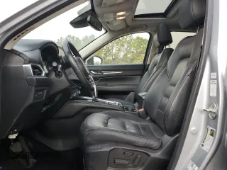2021 Mazda CX-5 Grand Touring with VIN JM3KFADM8M1339008, listed as a Copart auction lot 49150115 with 144,851 mi miles and Salvage Title. Bid and sale history available at carsss.com. Image 7.