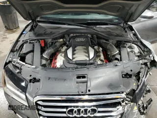 2012 Audi A8 z VIN WAURVAFD3CN025035, wystawiony jako Copart lot #52252915 z przebiegiem 71 312 mil mil oraz Szkoda całkowita • Salvage title. Historia ofert i sprzedaży dostępna na DreamBid. Obrazek 12.